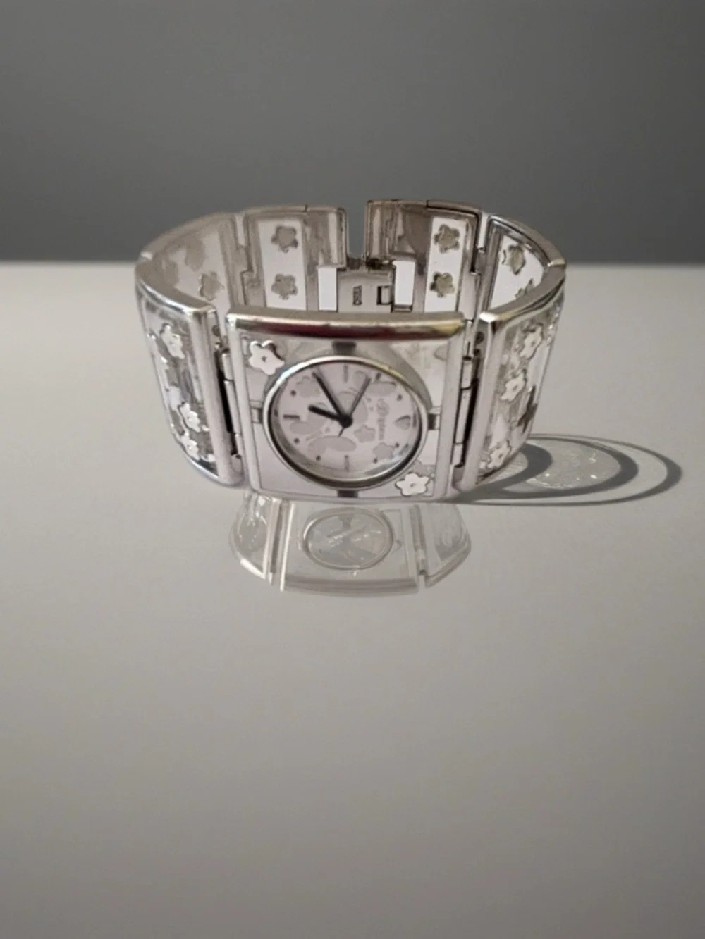 Brighton Gainesville watch features a design silver-tone butterflies & flowers.